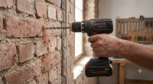 Rappresentazione di un trapano avvitatore a batteria con funzione percussione per forare pareti e muratura